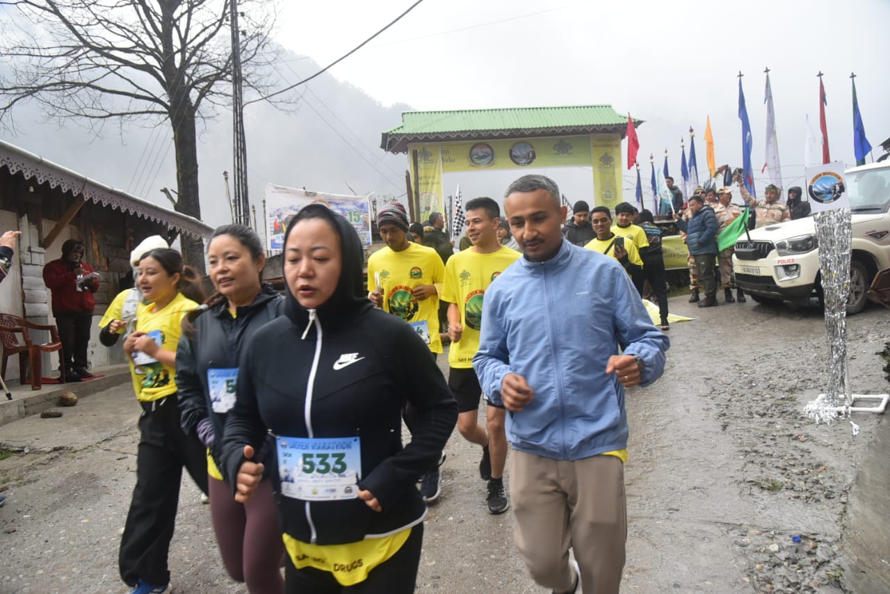 Runners charge out of the Lachen start gate