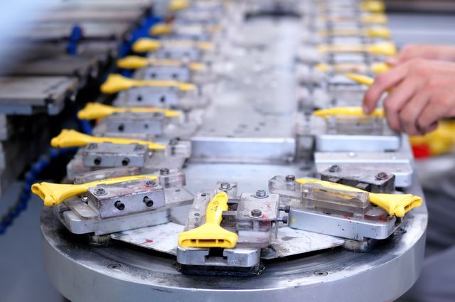 Automotive parts fixtures on a production line